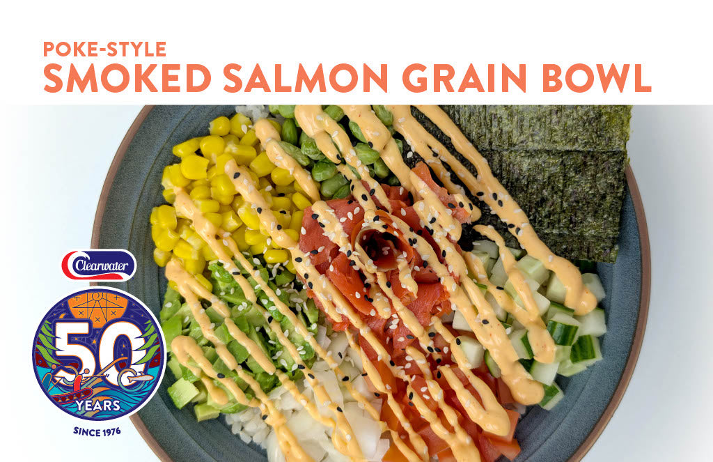 asian poke style grain bowl with smoked salmon and vegetables 